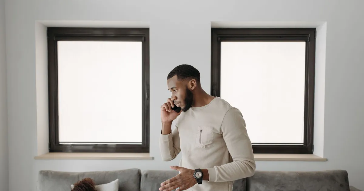 Person checking their phone early in the morning because they need money now